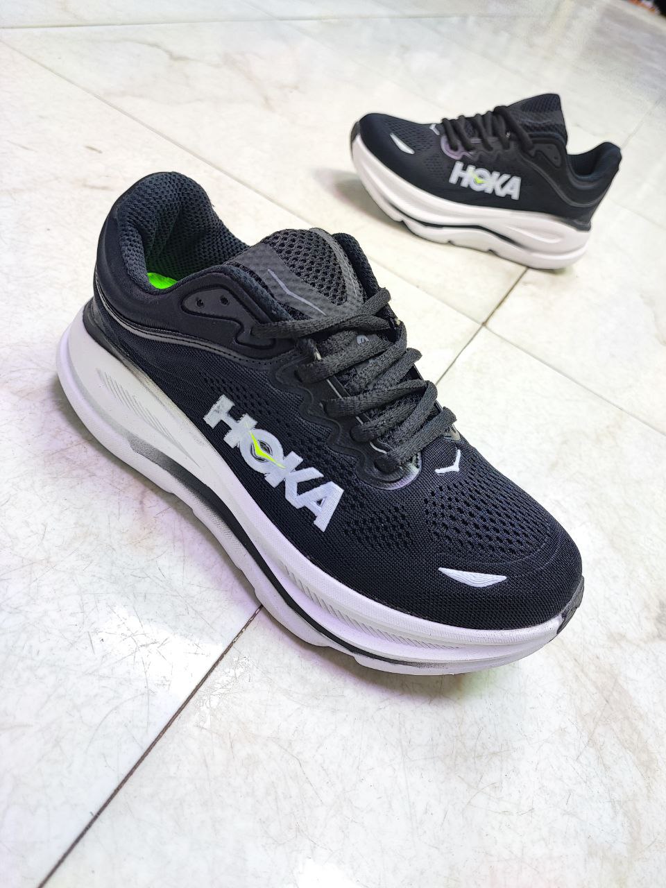 کتونی ورزشی هوکا باندی مشکی و سفید کد 2117 کتونی ورزشی هوکا باندی مشکی و سفید کد 2117