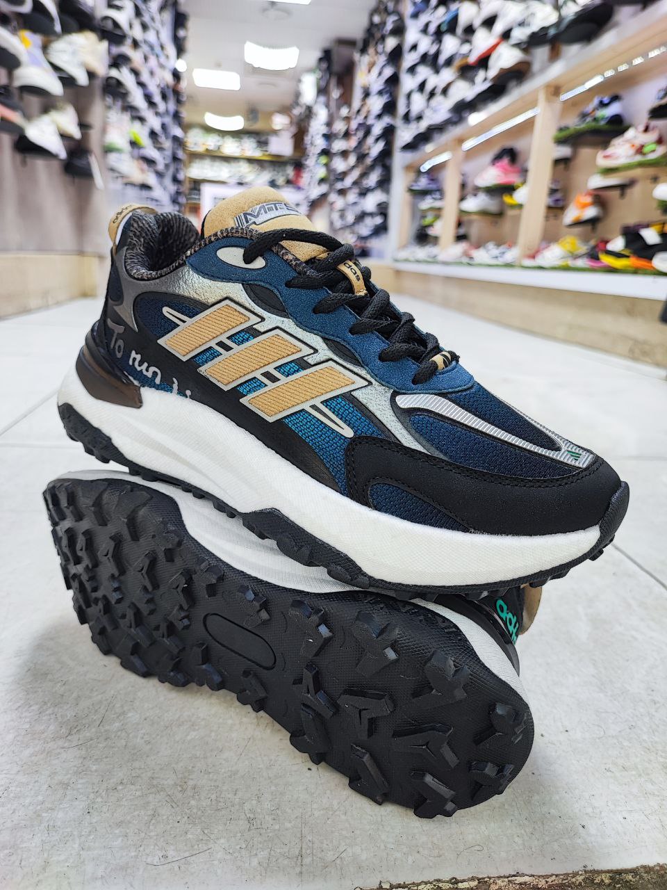 آدیداس مدل رانینگ آبی طلایی مشکی کد 2119 آدیداس مدل رانینگ آبی طلایی مشکی کد 2119