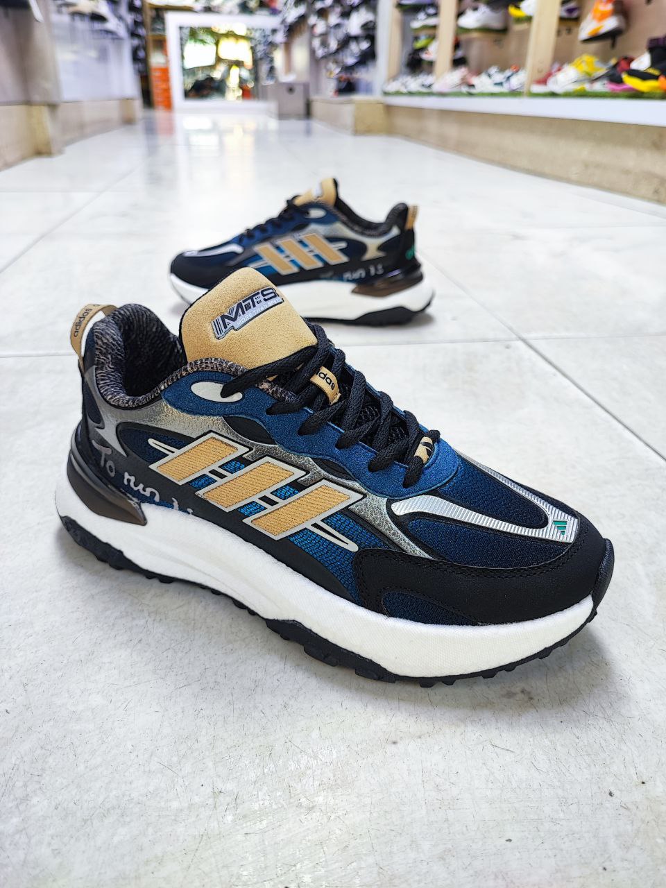 آدیداس مدل رانینگ آبی طلایی مشکی کد 2119 آدیداس مدل رانینگ آبی طلایی مشکی کد 2119