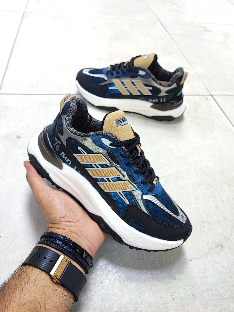 آدیداس مدل رانینگ آبی طلایی مشکی کد 2119 آدیداس مدل رانینگ آبی طلایی مشکی کد 2119